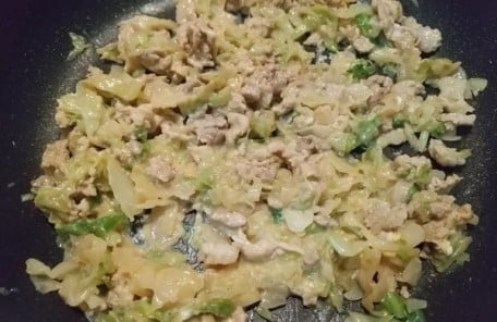 Add the beaten egg and cook.