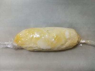 手前からラップを巻いて口を閉じる